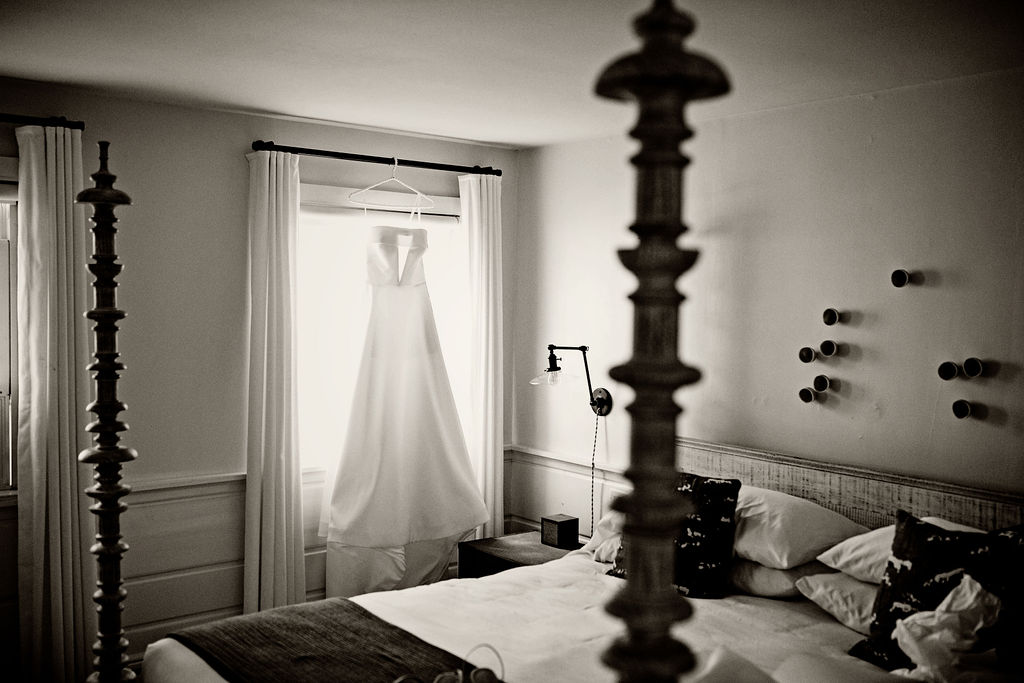 A wedding dress hanging in the Coonamessett Inn in Cape Cod
