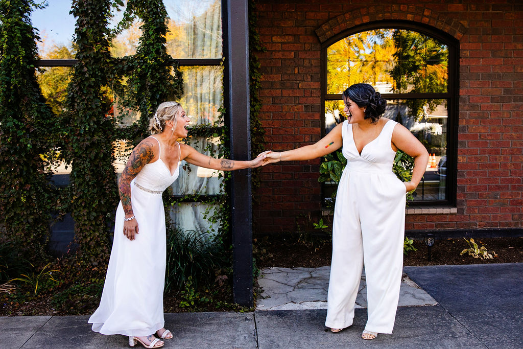 First look for two brides on their wedding day in Providence, Rhode Island.