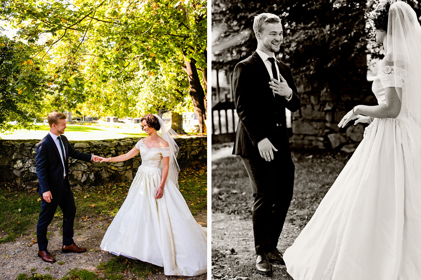 A touching first look with a bride and groom by a stone wall at their wedding.