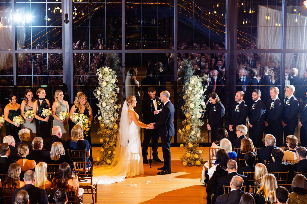 Couple getting married in an indoor ceremony at Roundhouse wedding