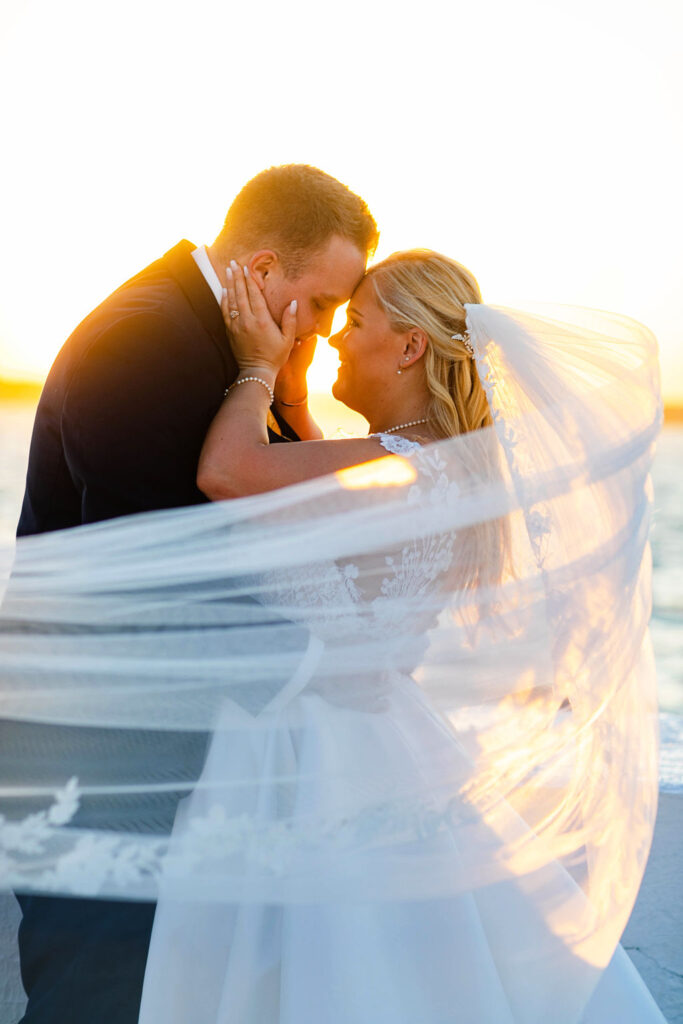 Bride and groom at sunset at Belle Mer wedding in Newport, RI 