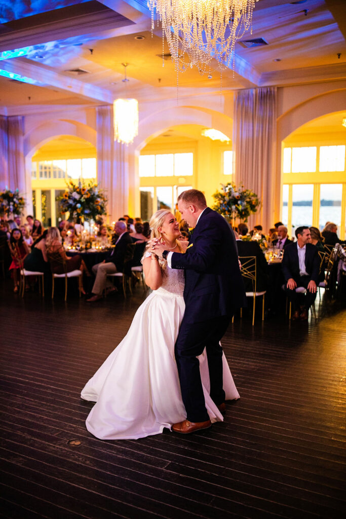 Bride and groom having their first dance at sunset at Belle Mer wedding in Newport, RI 