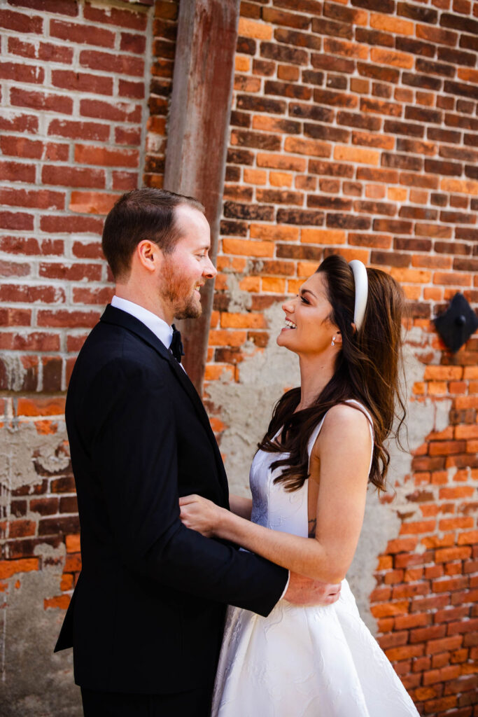 Bride and groom having their first look at Bristol Harbor Inn