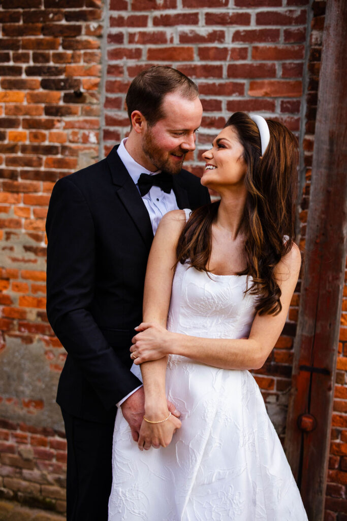 Bride and groom having their first look at Bristol Harbor Inn