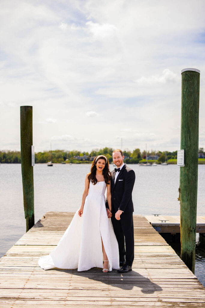 Bride and groom on the docks at Bristol Harbor Inn