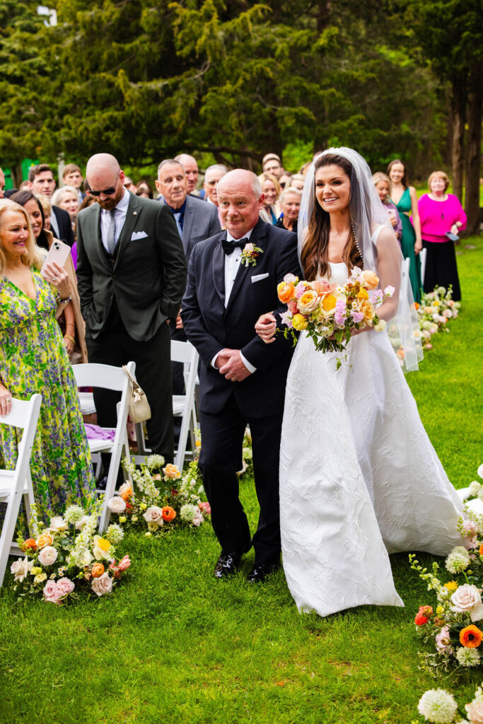 Bride walking down the aisle at a Mount Hope Farm Wedding