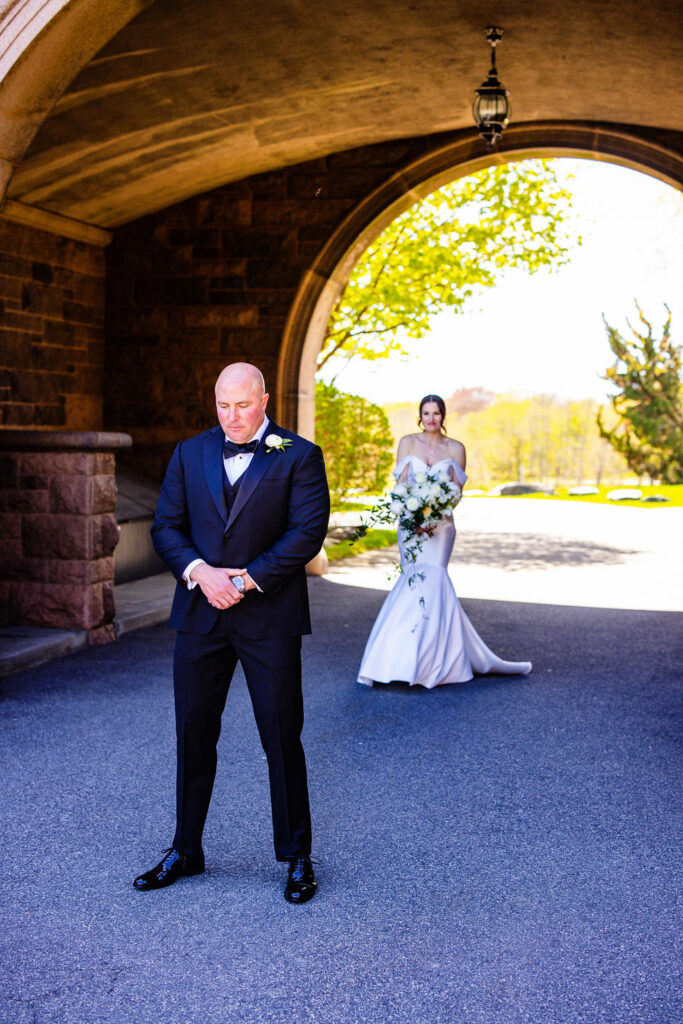 First look with bride and groom at Oceancliff wedding in Newport