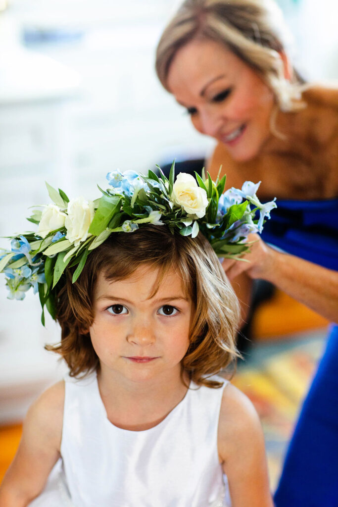 Bride with her bridesmaids getting ready for the wedding at the Belle Mer Island House in Newport, RI.