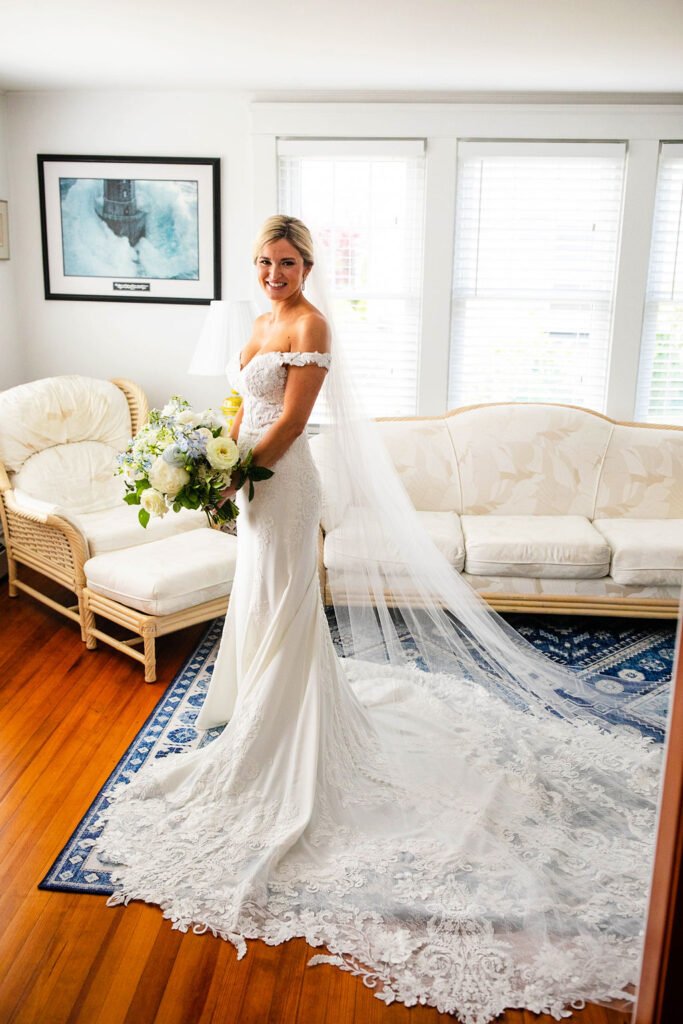 Bride with her bridesmaids getting ready for the wedding at the Belle Mer Island House in Newport, RI.