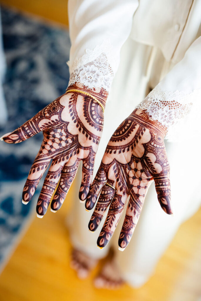 Henna on bride's hands for wedding 