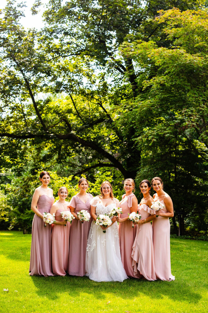 wedding party posing at wedding at the Castle Hotel in Tarrytown, NY