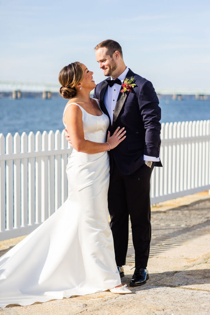 Bride and groom by lighthouse at Newport Harbor Island Resort wedding