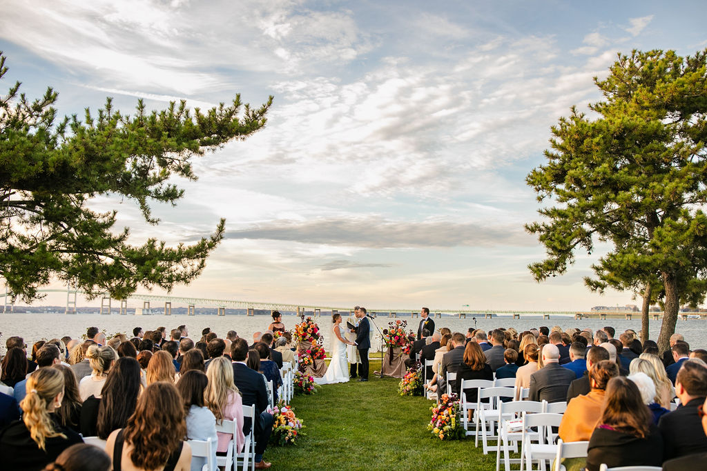 wedding ceremony by lighthouse with view of the Newport Bridge at Newport Harbor Island Resort wedding