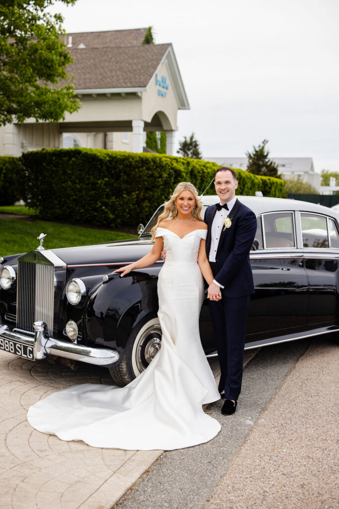 Bride and groom posing Belle Mer wedding in Newport, Rhode Island