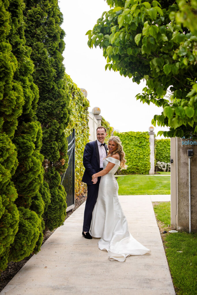 Bride and groom posing Belle Mer wedding in Newport, Rhode Island