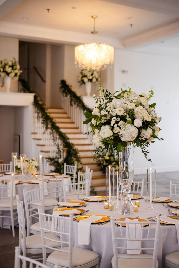 White and green florals at Belle Mer wedding reception in Newport, Rhode Island