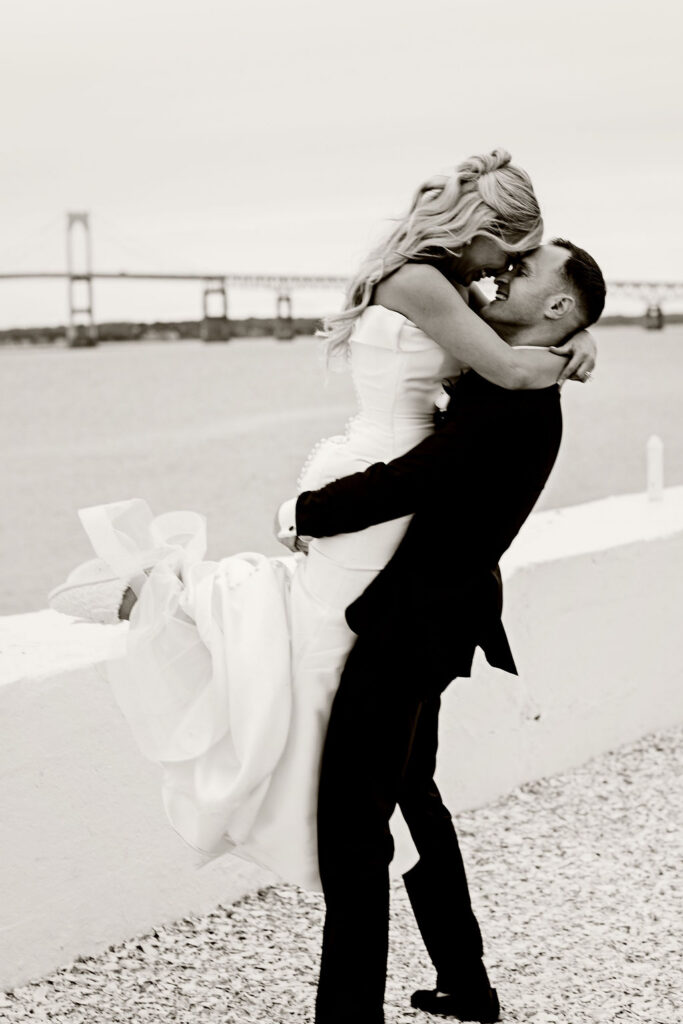 Bride and groom posing at sunset at Belle Mer wedding in Newport, Rhode Island