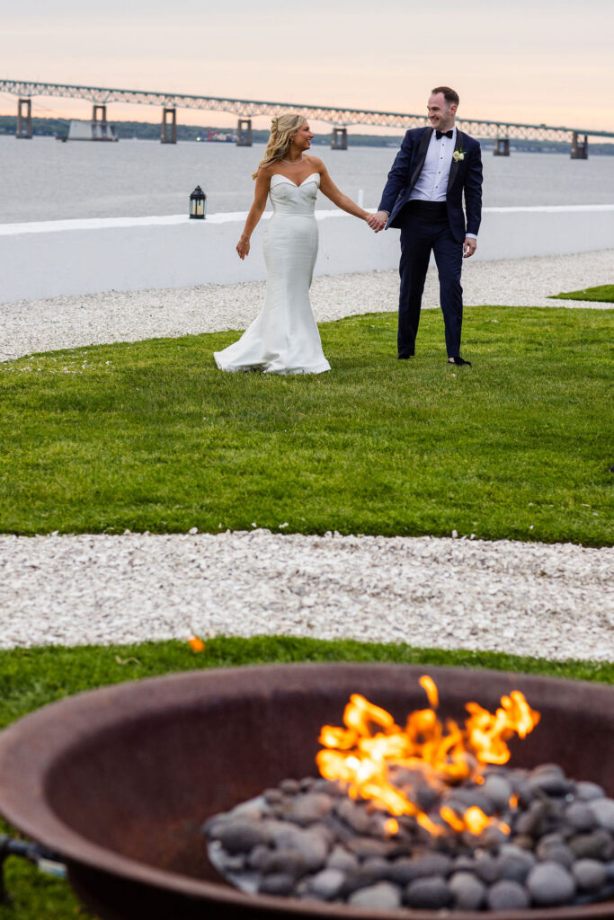 Bride and groom posing at sunset at Belle Mer wedding in Newport, Rhode Island